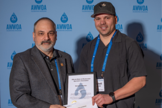 Mitchell Schneider, 2024 NAIT Fall Intake Winner Presented by NAIT Program Chair, Darren Demchuk