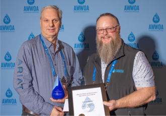 Darren Dirpose, 2024 Gerald Samuel Operator of Year Award Recipient Presented by AWWOA Chair, Chris Huston